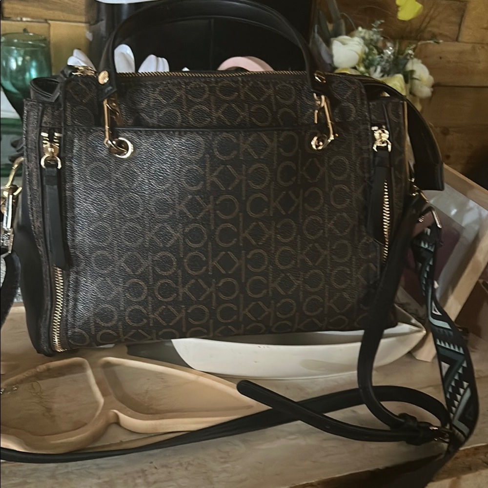 Calvin Klein Brown Satchel with Signature Style